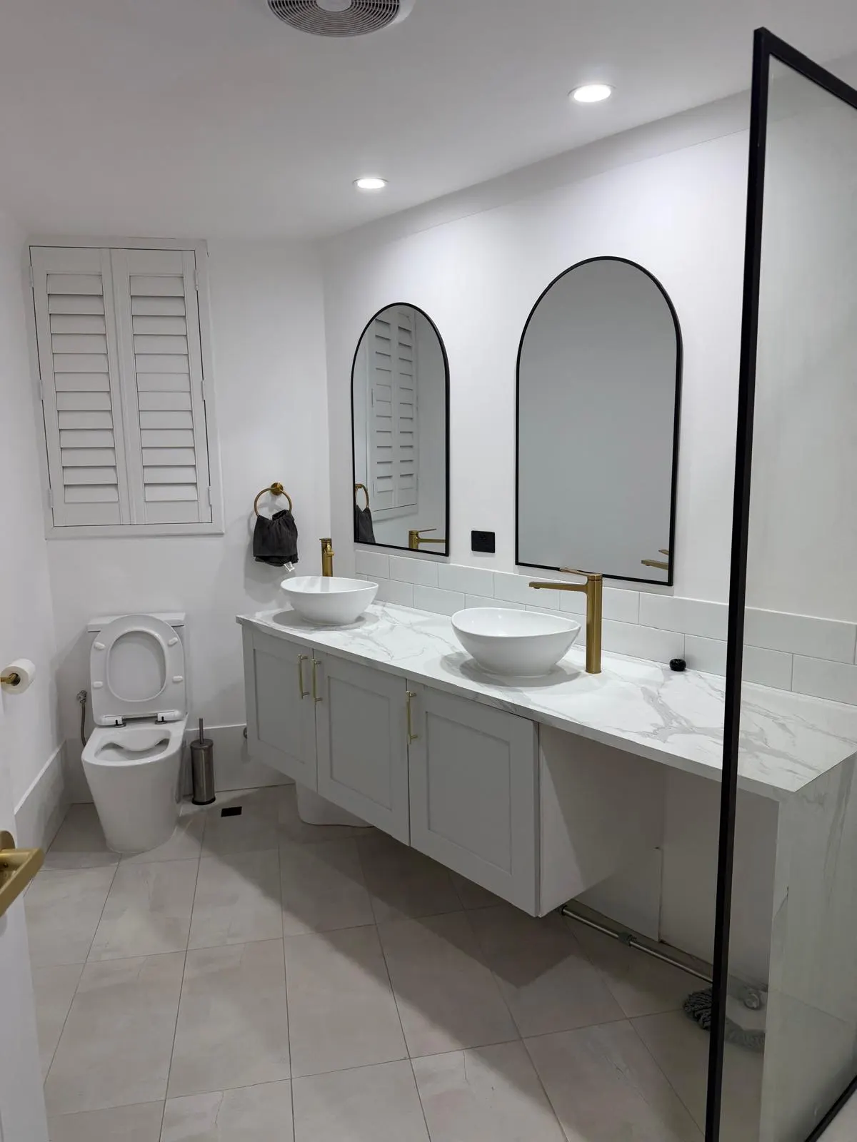 Double vanity and arched mirrors - residential clean by Freshco Kleen in Perth