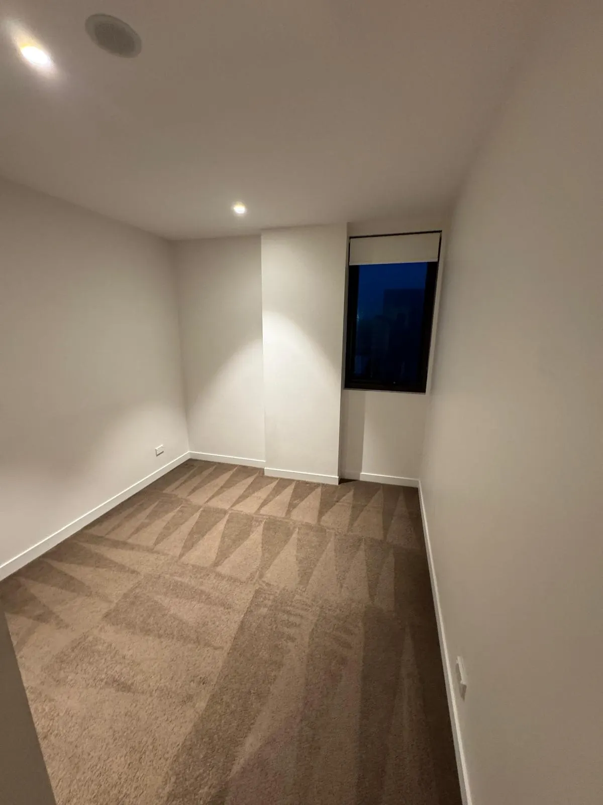 Carpeted bedroom vacuumed for handover - end of lease clean by Freshco Kleen in Perth