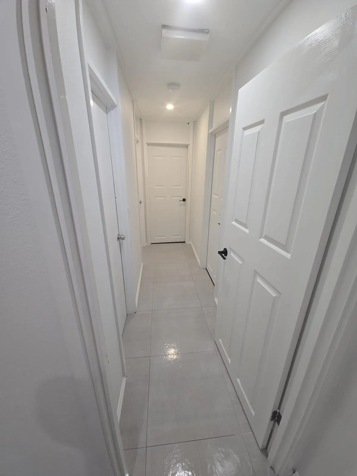 Hallway, doors and tiled floor - end of lease clean by Freshco Kleen in Perth