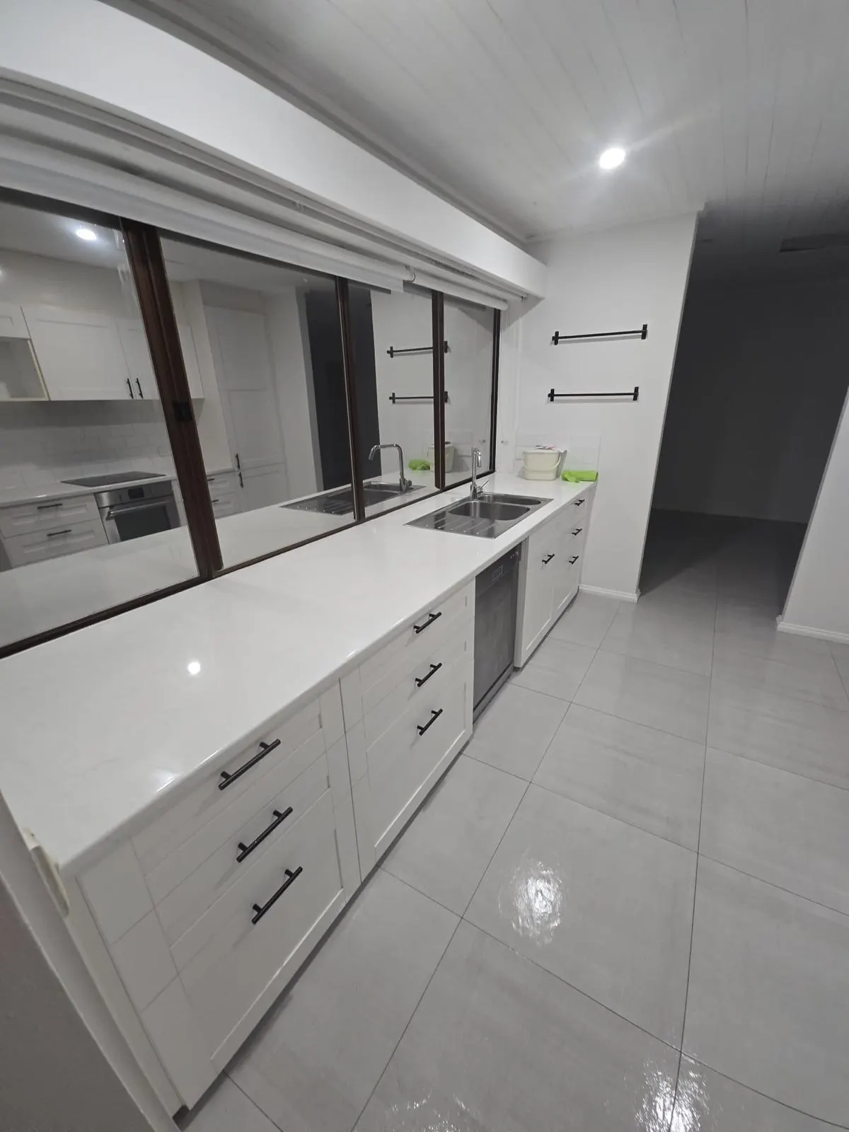 Kitchen bench and drawers in a vacated home - end of lease clean by Freshco Kleen in Perth